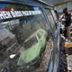 A painter strips paintwork and decals from a matatu or minibus-taxi at the Moha Graphics bodyshop in the Eastleigh area of Nairobi, Kenya.